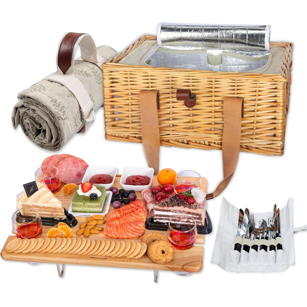 Picnic basket with cheese board and blanket